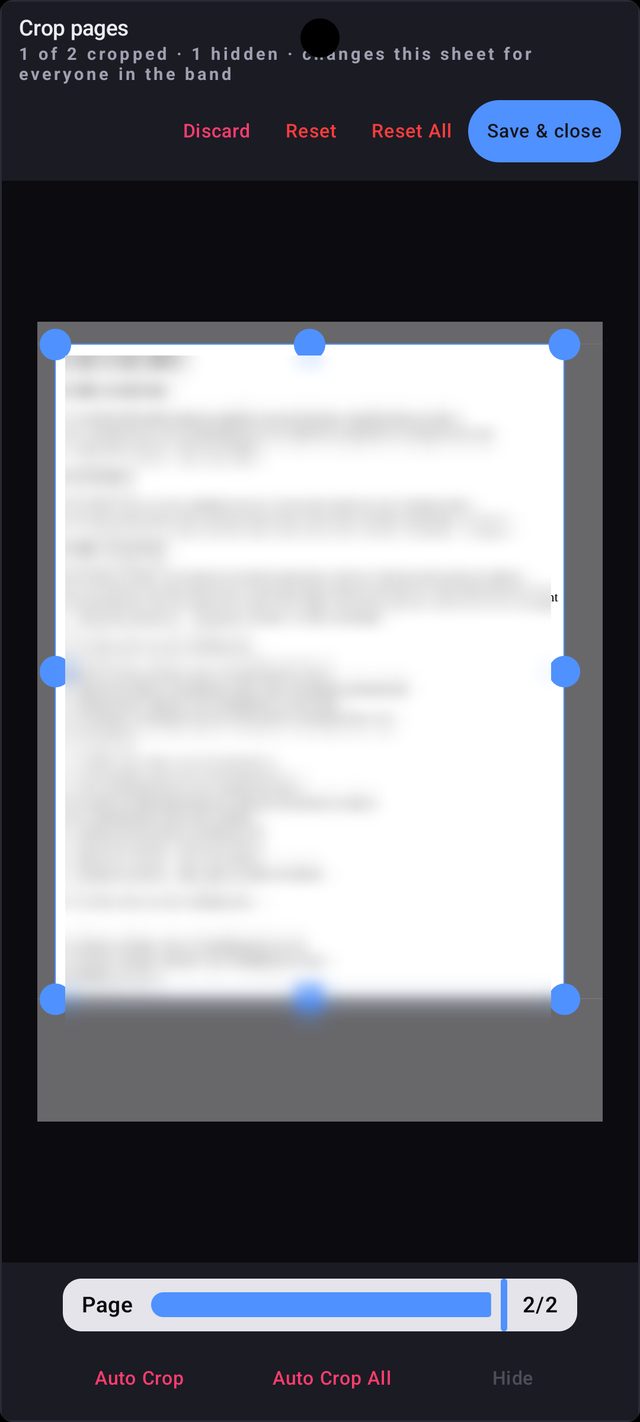 Crop editor with a lead sheet, corner handles and the Auto Crop and Hide buttons
